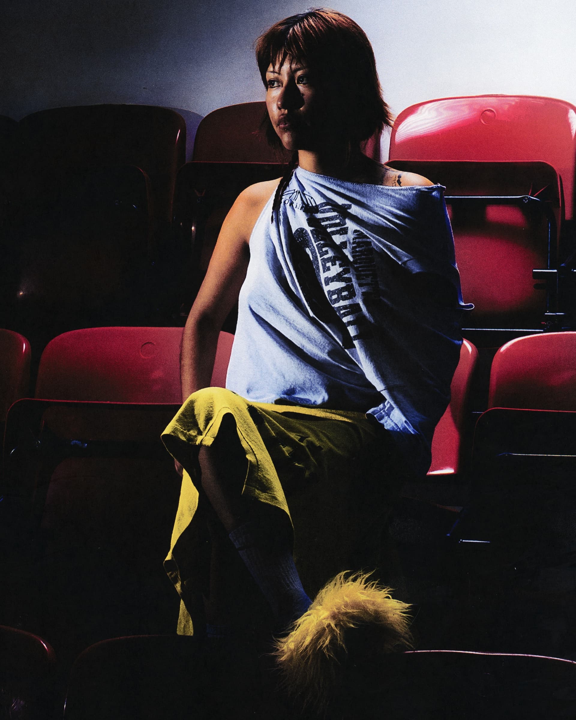 Gina Corrieri SS24 editorial, cinema seats, portrait. Photo by George William Vicary.