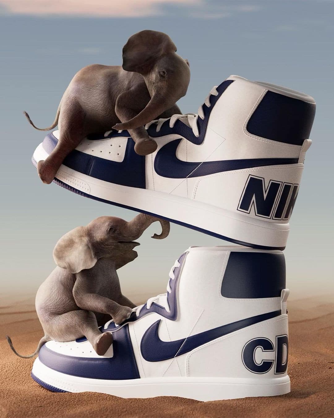 Comme des Garçons x Nike still, two small elephants climbing a navy-and-white Nike Terminator pair.